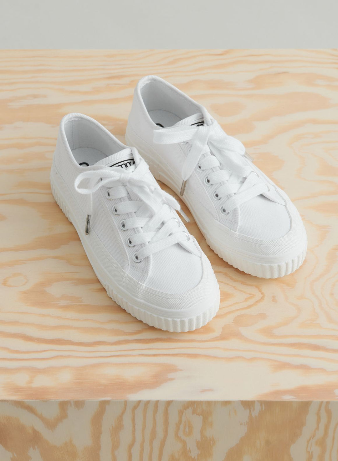 All white canvas sneakers on sale